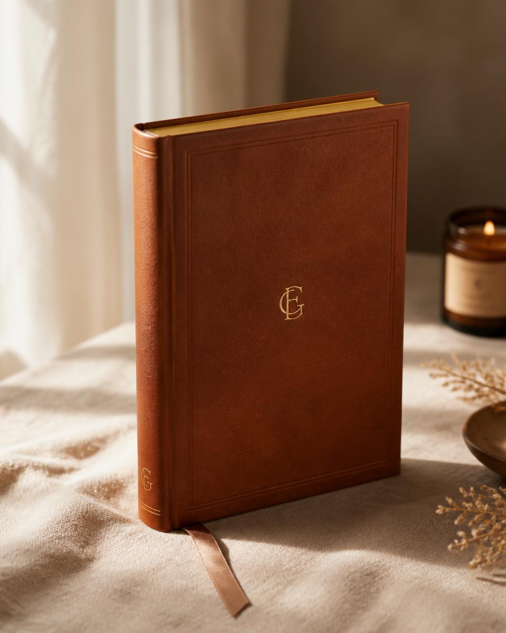 A beautifully prepared hardback memoir, resting in warm light